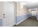 Condo hallway with carpet and neutral decor at 808 3Rd W Ave # 514, Bradenton, FL 34205