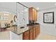 Updated kitchen with granite countertops, stainless steel appliances, and breakfast bar at 808 3Rd W Ave # 514, Bradenton, FL 34205