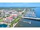 Aerial view of waterfront community with marina, bridge, and residential buildings at 808 3Rd W Ave # 514, Bradenton, FL 34205