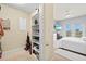 Walk-in closet with built-in shelving and ample storage space at 808 3Rd W Ave # 514, Bradenton, FL 34205