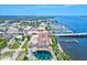 Aerial view showing building, tennis courts, and waterfront location at 808 3Rd W Ave # 514, Bradenton, FL 34205
