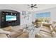 Spacious living room with comfortable sofas and large-screen TV at 808 3Rd W Ave # 514, Bradenton, FL 34205