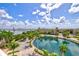 Aerial view showcasing the community pool and waterfront at 808 3Rd W Ave # 514, Bradenton, FL 34205