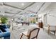 Spacious common area with comfortable seating, a pool table, and access to outdoor areas at 808 3Rd W Ave # 514, Bradenton, FL 34205