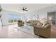Bright living room, featuring comfortable seating and large windows at 808 3Rd W Ave # 514, Bradenton, FL 34205