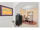Open dining area with glass table, four chairs, and wine storage at 808 3Rd W Ave # 514, Bradenton, FL 34205