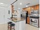 Modern condo kitchen with stainless steel appliances at 808 3Rd W Ave # 514, Bradenton, FL 34205