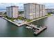 Aerial view of waterfront community with pool and boat docks at 5200 Brittany S Dr # 602, St Petersburg, FL 33715