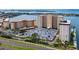 An aerial view showing the building, parking lot, and waterfront access at 5200 Brittany S Dr # 602, St Petersburg, FL 33715