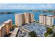 Aerial view showcasing the building, parking, and waterfront location at 5200 Brittany S Dr # 602, St Petersburg, FL 33715