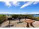 Community BBQ area with tables and waterfront views at 5200 Brittany S Dr # 602, St Petersburg, FL 33715
