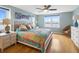 Main bedroom with water views, hardwood floors, and ample natural light at 5200 Brittany S Dr # 602, St Petersburg, FL 33715
