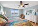 Main bedroom with water views, hardwood floors, and ample natural light at 5200 Brittany S Dr # 602, St Petersburg, FL 33715
