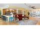 Open living space with kitchen, seating area, and bookcase at 5200 Brittany S Dr # 602, St Petersburg, FL 33715