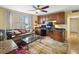 Home office with built-in desk and a comfortable sofa at 5200 Brittany S Dr # 602, St Petersburg, FL 33715