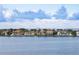 Stunning waterfront view with houses and bridge in the distance at 5200 Brittany S Dr # 602, St Petersburg, FL 33715