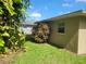 Landscaped backyard with lush greenery at 707 13Th W St, Palmetto, FL 34221