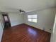 Spacious living room with hardwood floors and ceiling fan at 707 13Th W St, Palmetto, FL 34221