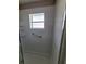 Clean shower with white tile and grab bar at 707 13Th W St, Palmetto, FL 34221