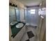 Clean bathroom with vanity, toilet, and shower at 707 13Th W St, Palmetto, FL 34221