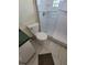 Bathroom featuring a toilet and shower stall at 707 13Th W St, Palmetto, FL 34221