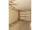 Garage with ceiling fan and open door at 707 13Th W St, Palmetto, FL 34221
