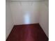 Walk-in closet with wire shelving and dark purple carpet at 707 13Th W St, Palmetto, FL 34221