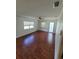 Bright living room featuring hardwood floors and lots of natural light at 707 13Th W St, Palmetto, FL 34221