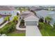 Single-Gathering home with two-car garage and landscaped yard at 10417 Crooked Creek Ct, Parrish, FL 34219
