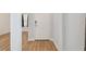 Light and bright entryway with wood-look floors at 10417 Crooked Creek Ct, Parrish, FL 34219