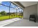Enjoy the view from this screened patio, complete with grill at 10417 Crooked Creek Ct, Parrish, FL 34219