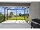 Spacious screened patio with backyard and lake views at 10417 Crooked Creek Ct, Parrish, FL 34219