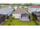 Single-Gathering home with a screened patio and grassy backyard at 10417 Crooked Creek Ct, Parrish, FL 34219