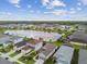 Community overview showcasing lake and homes at 10417 Crooked Creek Ct, Parrish, FL 34219