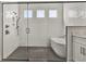 Spa-like bathroom with soaking tub and walk-in shower at 17931 Palmiste Dr, Bradenton, FL 34202