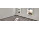 Bright bedroom with neutral carpeting and large windows at 17931 Palmiste Dr, Bradenton, FL 34202