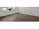 Bright bedroom with hardwood floors and large windows at 17931 Palmiste Dr, Bradenton, FL 34202