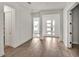 Bright entryway with hardwood floors, and neutral paint at 17931 Palmiste Dr, Bradenton, FL 34202