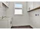 Laundry room with cabinets and countertop at 17931 Palmiste Dr, Bradenton, FL 34202