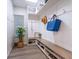 Convenient mudroom with bench seating and storage at 5727 Riegels Point Rd, Sarasota, FL 34242