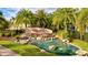 Community entrance with a water feature and the name Soleil at 8214 Las Lilias Ct, Sarasota, FL 34243