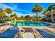 Inviting community pool with plenty of lounge chairs at 8214 Las Lilias Ct, Sarasota, FL 34243