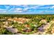 Aerial view of community with pool, clubhouse, and various buildings at 8214 Las Lilias Ct, Sarasota, FL 34243