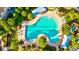 Community pool with lap lanes and surrounding lounge area at 8214 Las Lilias Ct, Sarasota, FL 34243