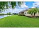 Peaceful backyard setting backing up to a pond at 8214 Las Lilias Ct, Sarasota, FL 34243