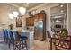 Community kitchen with granite counters and modern appliances at 8214 Las Lilias Ct, Sarasota, FL 34243