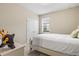 Cozy bedroom with a double bed and neutral decor at 8214 Las Lilias Ct, Sarasota, FL 34243