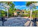 Community dog park with shaded seating areas at 8214 Las Lilias Ct, Sarasota, FL 34243