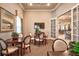Common area with a small table and comfortable seating at 8214 Las Lilias Ct, Sarasota, FL 34243