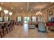 Spacious clubhouse with comfortable seating and dining areas at 8214 Las Lilias Ct, Sarasota, FL 34243